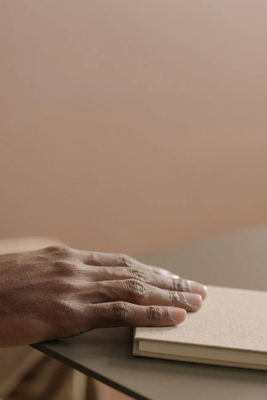 Hands resting gently, nourishment and care