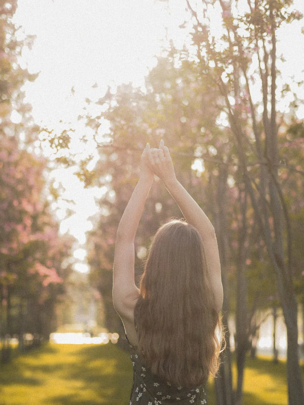 Woman in fluid somatic movement, wide natural light